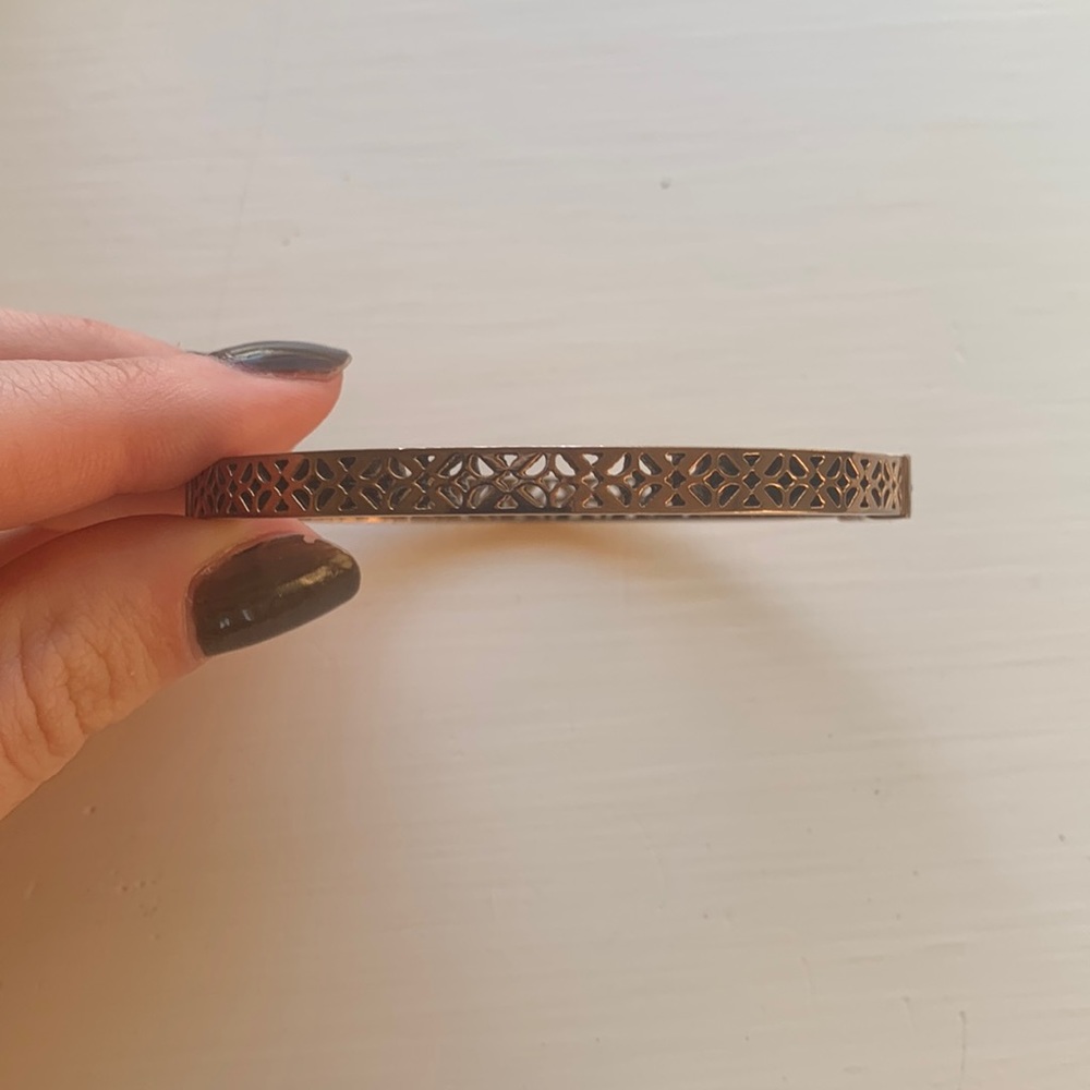 Rose gold fossil cut out bracelet